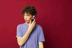 guy with red curly hair comb hair care posing isolated background photo