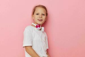 cute girl in a white t-shirt with headphones Lifestyle unaltered photo