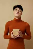 Photo young boyfriend posing in brown sweater self confidence fashion Lifestyle unaltered