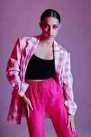 pretty woman pink pants fashion clothing posing isolated background unaltered photo