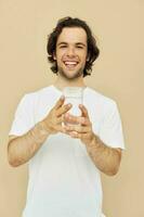 Cheerful man with a white mug in his hands emotions posing Lifestyle unaltered photo