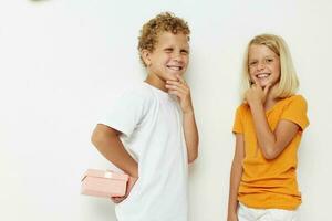 Boy and girl holiday friendship with a gift lifestyle unaltered photo