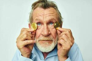 elderly man cryptocurrency bitcoin face close up investment cropped view photo