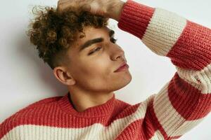 Attractive man teen fashion emotions light background photo