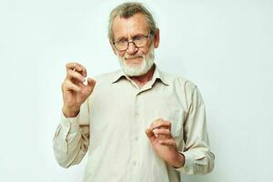 elderly man wears glasses in shirts isolated background photo