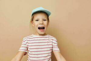 Portrait of happy smiling child girl posing baby clothes fun Lifestyle unaltered photo