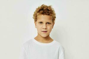 curly boy children's style fashion emotions childhood unaltered photo