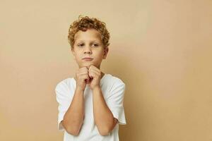 Photo of young boy children's style fashion emotions isolated background