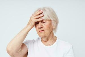 elderly woman health lifestyle migraine isolated background photo