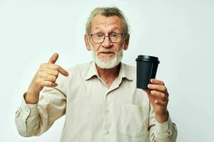 old man in a shirt and glasses a black glass light background photo