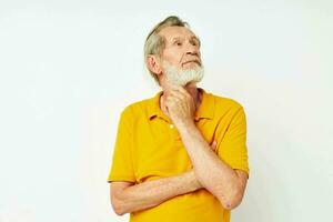 Senior grey-haired man with a gray beard emotion gestures hands cropped view photo