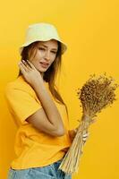 portrait of a young woman wearing a hat dry flowers summer style isolated background photo