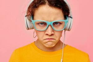 beautiful woman wearing headphones blue glasses close-up emotions Lifestyle unaltered photo