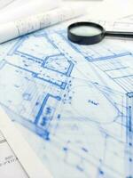 Hands of Engineer working on blueprint. Architecture interior concept. photo