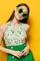 woman emotion fashion stylish style beautiful yellow sunglasses happy young green photo