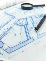 Hands of Engineer working on blueprint. Architecture interior concept. photo