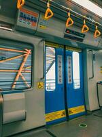 Jakarta, Indonesia, June 16, 2022 The Interior of Mass Rapid Transit. MRT alleviate the severe traffic congestion in the DKI Jakarta metropolitan area. photo