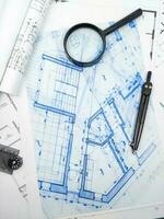 Hands of Engineer working on blueprint. Architecture interior concept. photo