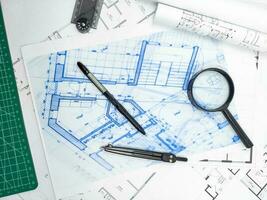 Hands of Engineer working on blueprint. Architecture interior concept. photo