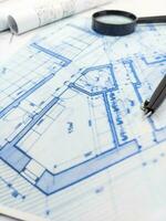 Hands of Engineer working on blueprint. Architecture interior concept. photo