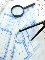 Hands of Engineer working on blueprint. Architecture interior concept. photo