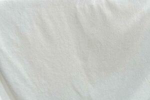White towel texture background with small wave pattern taken with soft light photo