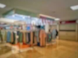 Empty blurry mall background. defocus business office interior. Light lifestyle shopping mall or supermarket. Suitable for card or site design photo