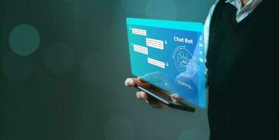 Business man using digital chatbot application Artificial Intelligence at home for online customer service. AI Chat Technology for Seamless Communication and Customer Engagement. photo