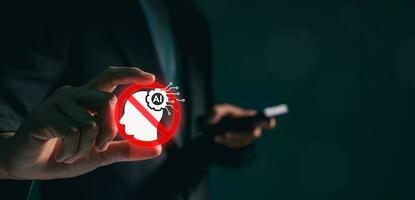 Business man using digital chatbot Artificial Intelligence AI with hacking and stop alert. cyber attack network, spyware or Malicious software. Technology cyber security and cybercrime. photo