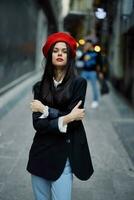Fashion woman portrait walking tourist in stylish clothes with red lips walking down narrow city street, travel, cinematic color, retro vintage style, dramatic look without smile sadness. photo