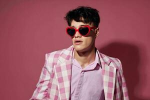 Photo of romantic young boyfriend self confidence pink plaid blazer fashion posing model studio