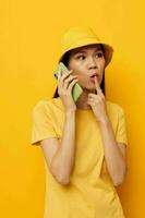 woman with Asian appearance talking on the phone posing fashion Lifestyle unaltered photo