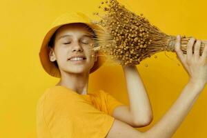 optimistic young woman in a yellow t-shirt flax bouquet emotions summer style Lifestyle unaltered photo