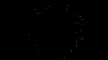 Golden ring fireworks glowing. Golden particles exploding. Circle ring explosive, isolated on black background. Circle frame explosive. video