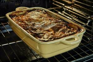 Casserole in ceramic dish after baking in the oven photo