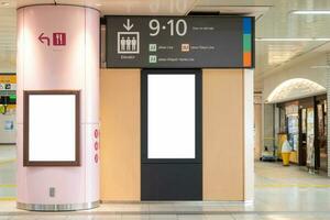 Blank advertising billboard at airport,mockup poster media template ads display photo