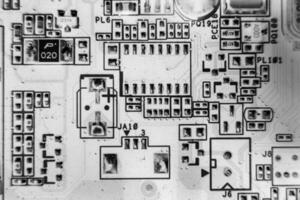 resistors on the blue printed circuit board. pcb photo