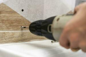 drilling holes in porcelain stoneware, drilling holes in tiles photo