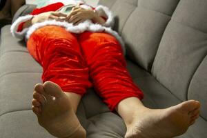 Santa is sick and not feeling well. Santa measures blood pressure photo