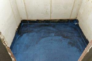 Waterproofing of the bathroom. waterproofing mortar. Home renovation photo