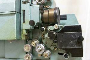 old vintage movie projector. close-up of a stylish movie projector photo