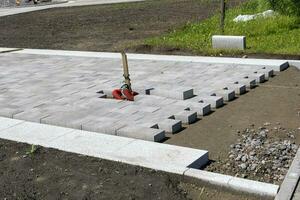 construction of pedestrian paths in the city square. city park photo