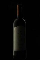 Sosnovy Bor, RUSSIA - DECEMBER 22, 2022 dark bottle of Askaneli wine photo