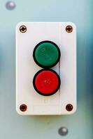 green and red buttons for starting and turning off equipment photo