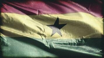 Retro aged Ghana flag waving on the wind. Old vintage Ghanaian banner swaying on the breeze. Seamless loop. video