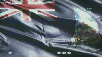 vhs vídeo cassete registro Falkland ilhas bandeira acenando em a vento. falha ruído com Tempo contador gravação bandeira balançando em a brisa. desatado laço. video