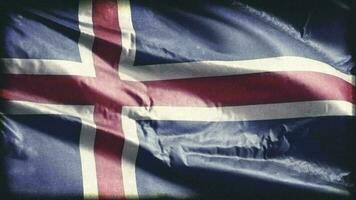 Retro aged Iceland flag waving on the wind. Old vintage banner swaying on the breeze. Seamless loop. video
