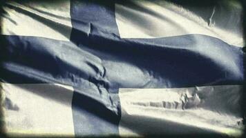 Retro aged Finland flag waving on the wind. Old vintage Finnish banner swaying on the breeze. Seamless loop. video