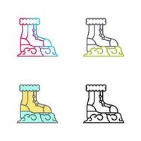 icono de vector de botas de nieve