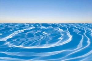 azul cielo y Oceano con ondas en el superficie. desenfocar borroso transparente azul mar superficie textura con salpicaduras y burbujas agua olas con brillante modelo textura antecedentes. foto
